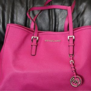 Pink Micheal Kors shoulder bag.